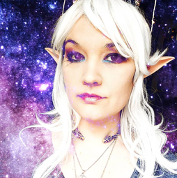 A picture of me with white hair and elf ears with a starry background